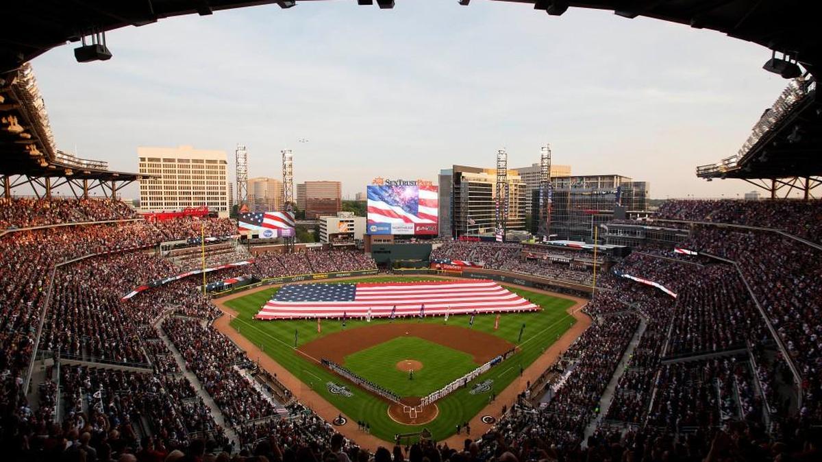 The national anthem is played before a baseball game between the Atlanta Braves and the San Diego Padres in Atlanta, Friday, April 14, 2017, at the first regular-season game in SunTrust Park.