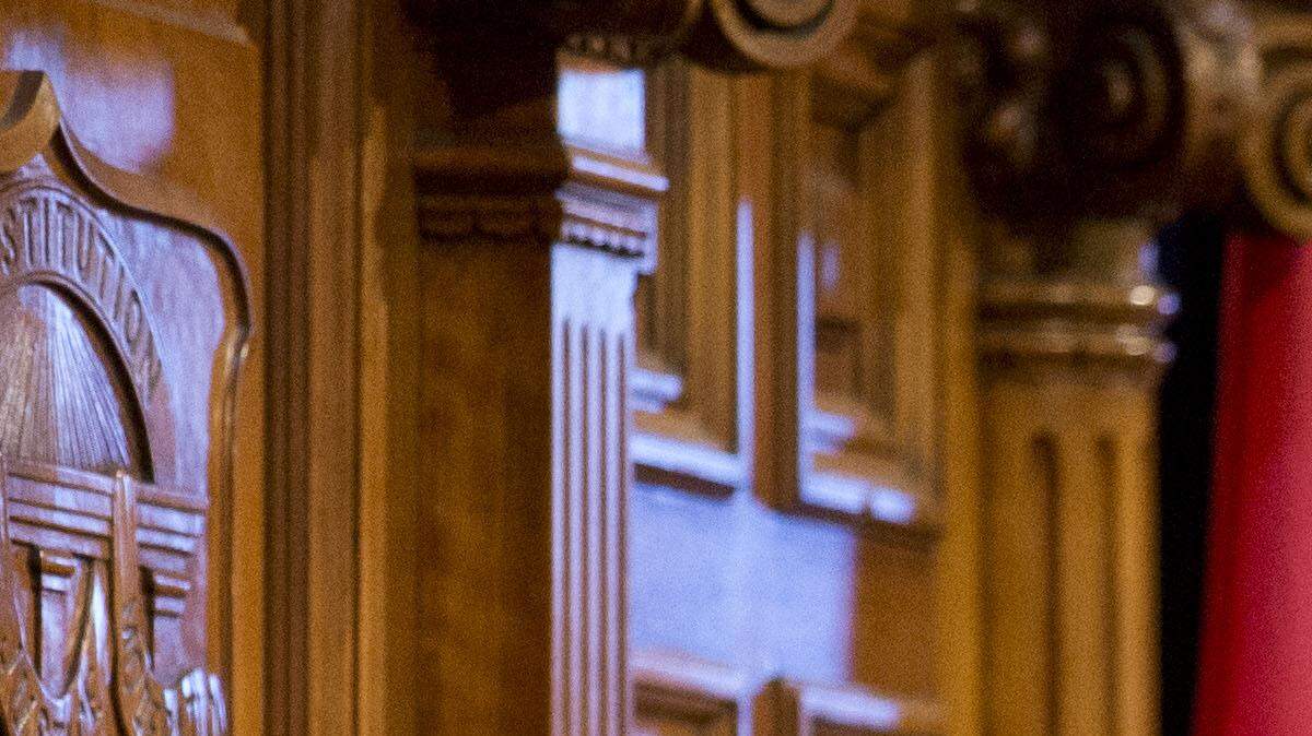 Georgia Gov. Nathan Deal, right, delivers his State of the State address on the House floor as House Speaker David Ralston, left, and Lt. Gov. Casey Cagle look on at the Capitol Wednesday, Jan. 13, 2016, in Atlanta.
