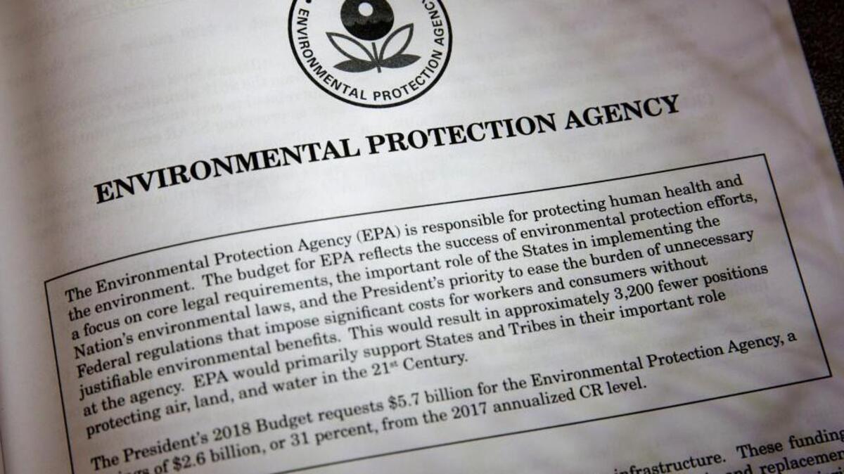 Proposals for the Environmental Protection Agency in President Donald Trump's first budget are displayed at the Government Printing Office in Washington, Thursday, March, 16, 2017. The $1.15 trillion presentation proposes a reordering of national spending priorities, pumping significantly more money into the military and homeland security while sharply cutting foreign aid, medical research and the arts. The EPA also takes a big hit in the budget proposal.
