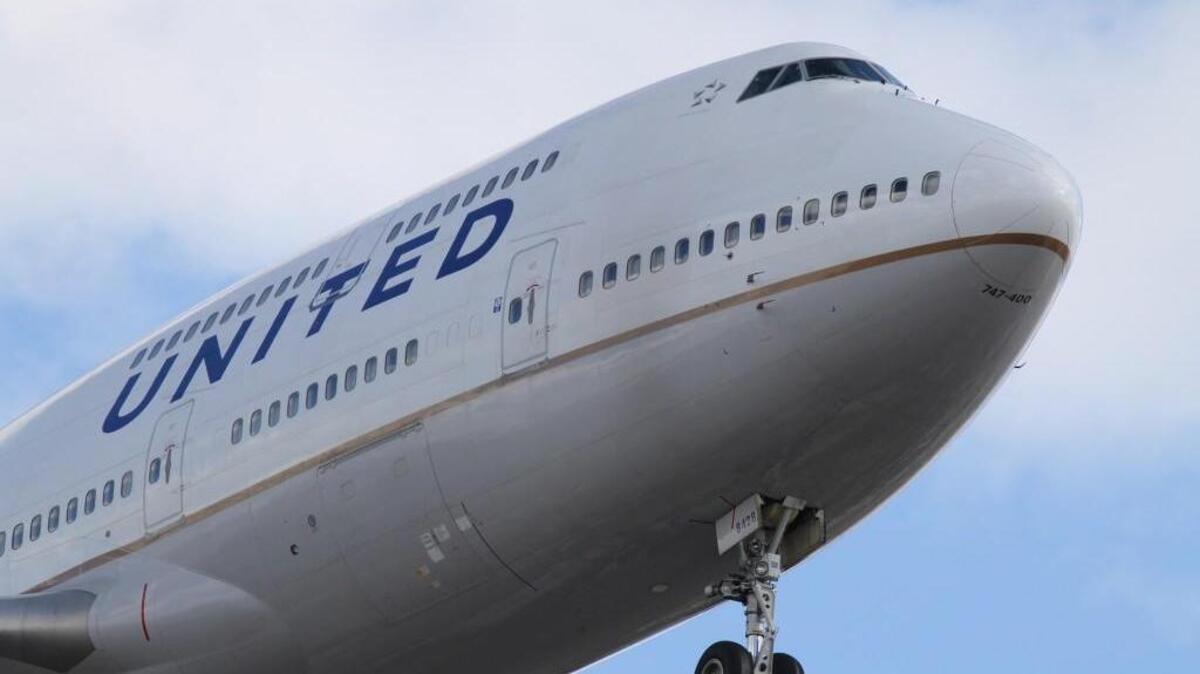 A United Airlines 747-400 landing on 28C at the Chicago O'Hare Airport.