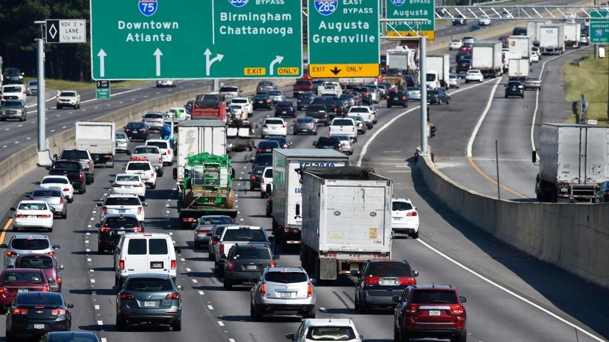 Heavy traffic traveling north bound on Interstate 75 moves slowly, as a major evacuation has begun in preparation for Hurricane Irma, Friday, Sept. 8, 2017, in Forrest Park, south of Atlanta.