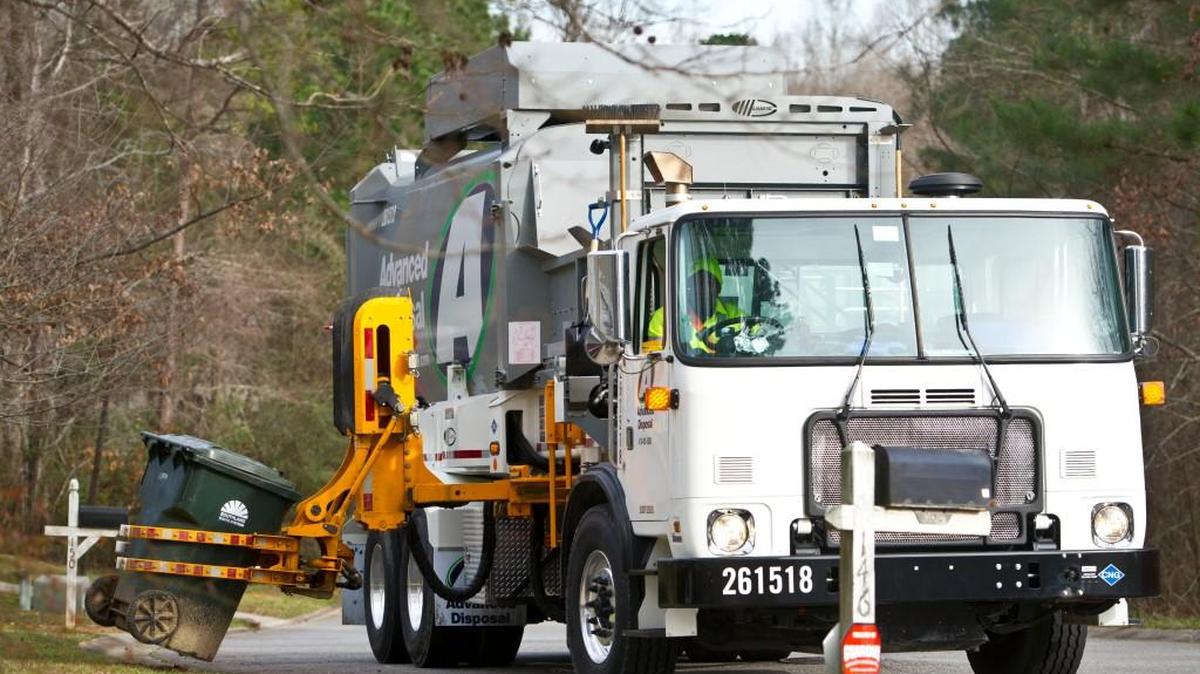 WOODY MARSHALL/THE TELEGRAPH.Macon, Georgia, 01/06/2016:.An advance disposal Automated Side Loaded garbage truck works in the Northridge subdivision.