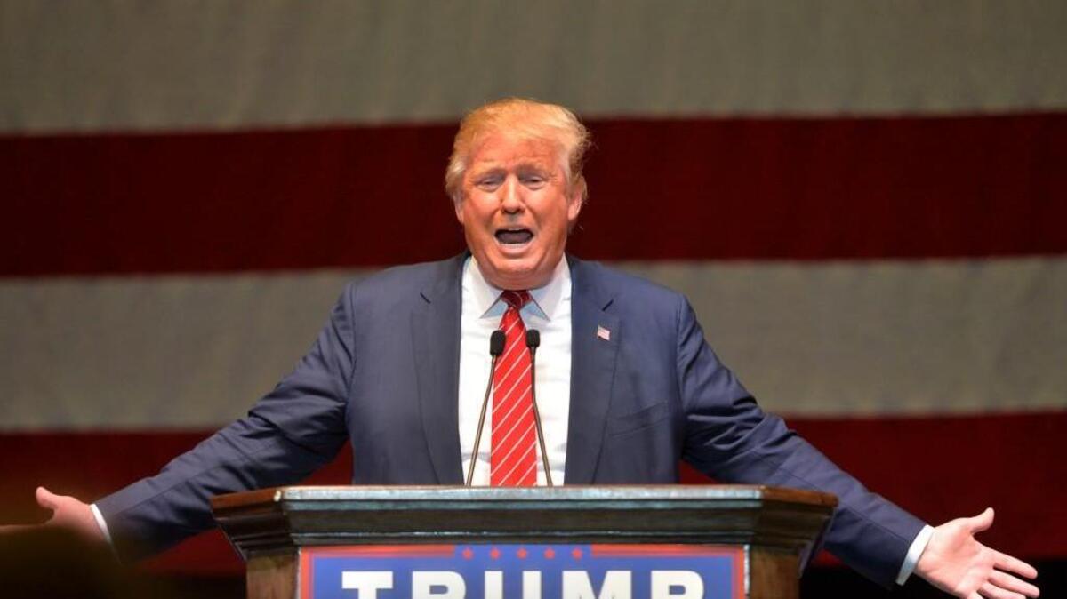 Presidential candidate Donald Trump addresses a near capacity crowd at a Macon Coliseum rally last November.
