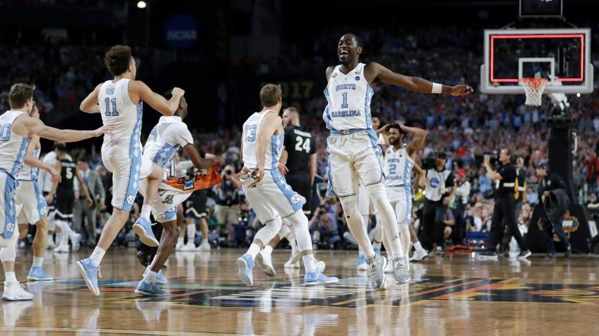 North Carolina players celebrate after the finals of the Final Four NCAA college basketball tournament against Gonzaga, Monday, April 3, in Glendale, Ariz. North Carolina won 71-65.
