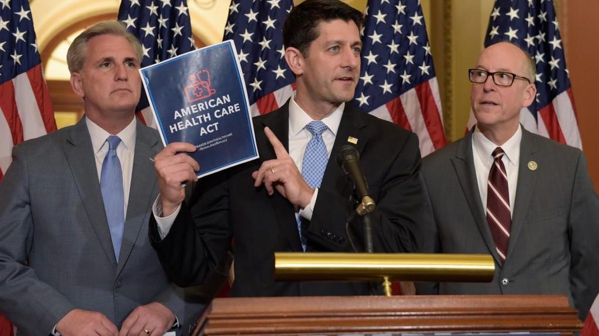 House Speaker Paul Ryan of Wis., center, standing with Energy and Commerce Committee Chairman Greg Walden, R-Ore., right, and House Majority Whip Kevin McCarthy, R-Calif., left, speaks during a news conference on the American Health Care Act on Capitol Hill in Washington, Tuesday, March 7.
