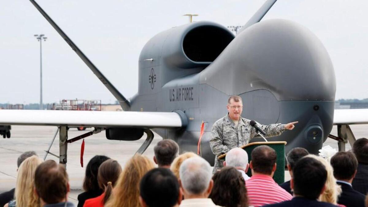 In June, 2017, Brigadier Gen. John C. Kubinec, commander of Warner Robins Air Logistics Complex at Robins Air Force Base, talks about the Global Hawk that was repainted by base workers.