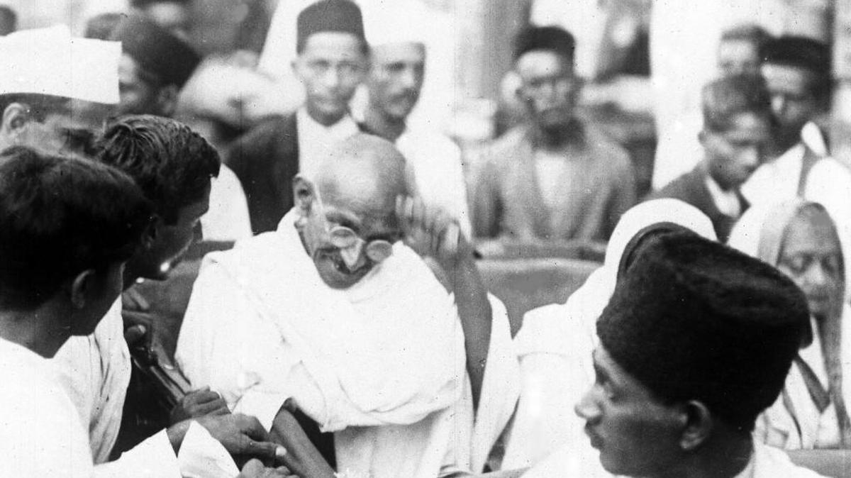 Indian spiritual leader Mahatma Gandhi acknowledges the crowd who welcomed him at Bombay Station in India on May 2, 1929.