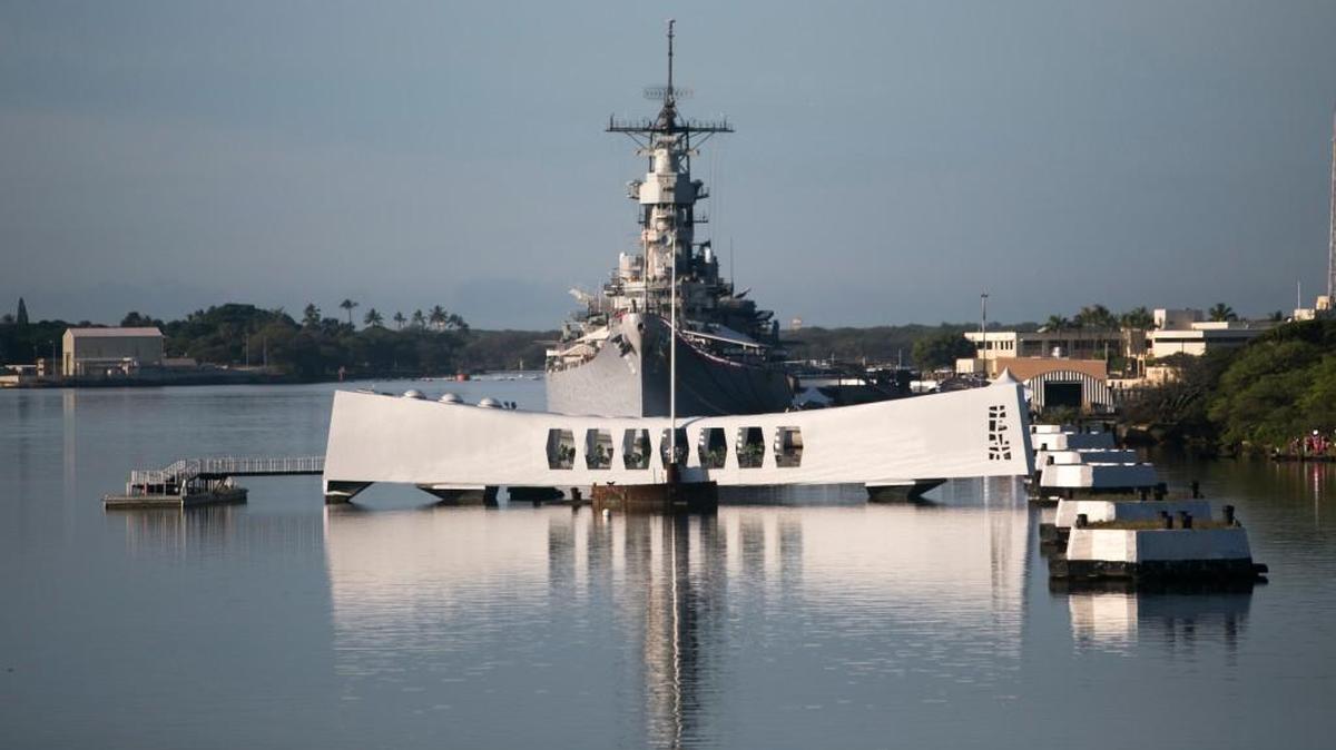 The USS Arizona memorial is seen with the USS Missouri in the background in Honolulu, Hawaii.