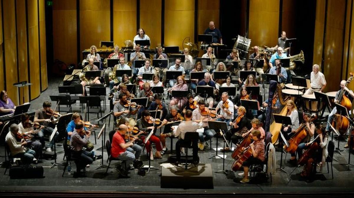 The Macon Symphony Orchestra rehearses "A Fond Farewell" program directed and conducted by Gerald Steichen. The MSO performed for the final time featuring soloist Jasmine Habersham on Oct. 14 at The Grand Opera House.