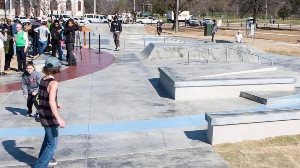 Skaters try out the skate park at Central City Park.