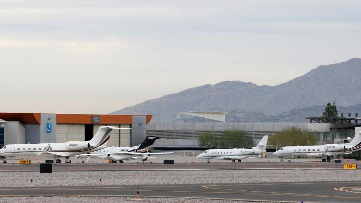 Private jets are parked at Scottsdale Airport in Scottsdale, Arizona.