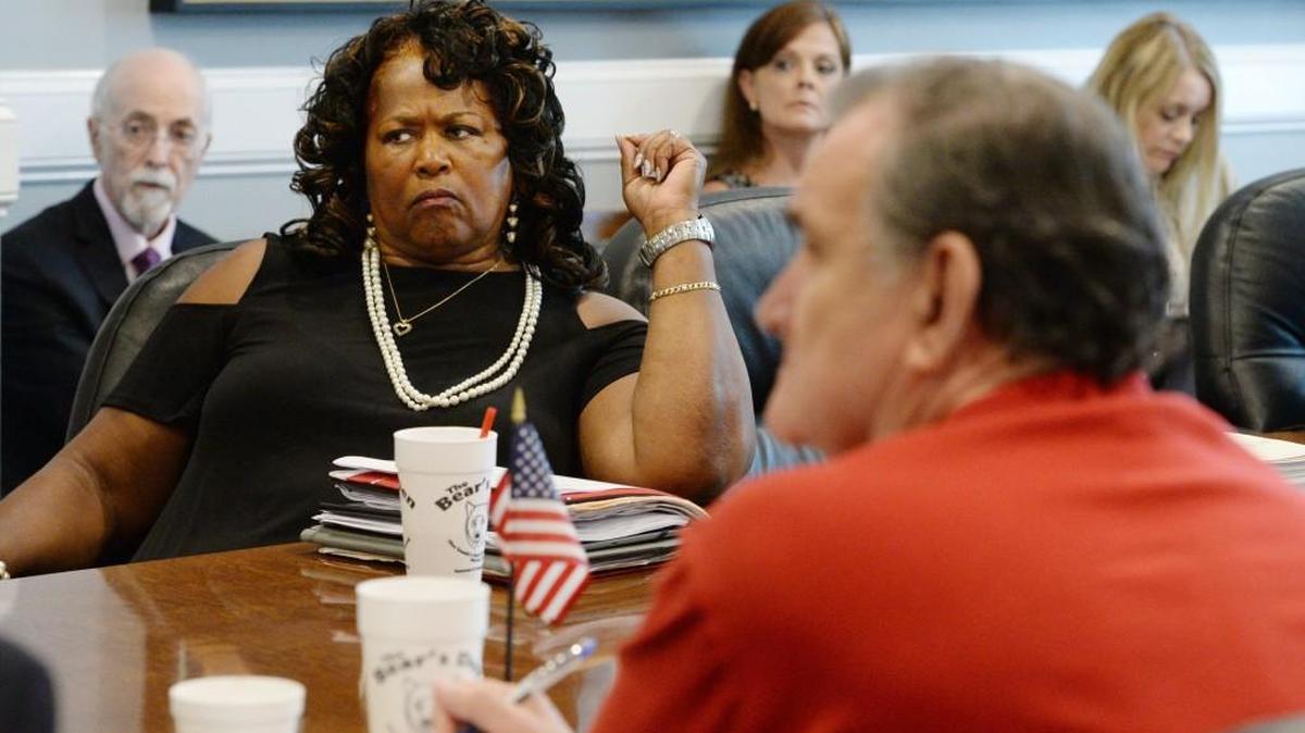 Macon-Bibb County Commissioners Elaine Lucas, left, and Joe Allen, right, listen to a May 22 presentation by auditor Miller Edwards, who told them that a forensic audit might not be as valuable to them as just simply monitoring revenues and expenditures on a monthly basis — especially if there is no criminal activity suspected. Lucas and Allen later rewrote their proposal for a forensic audit.