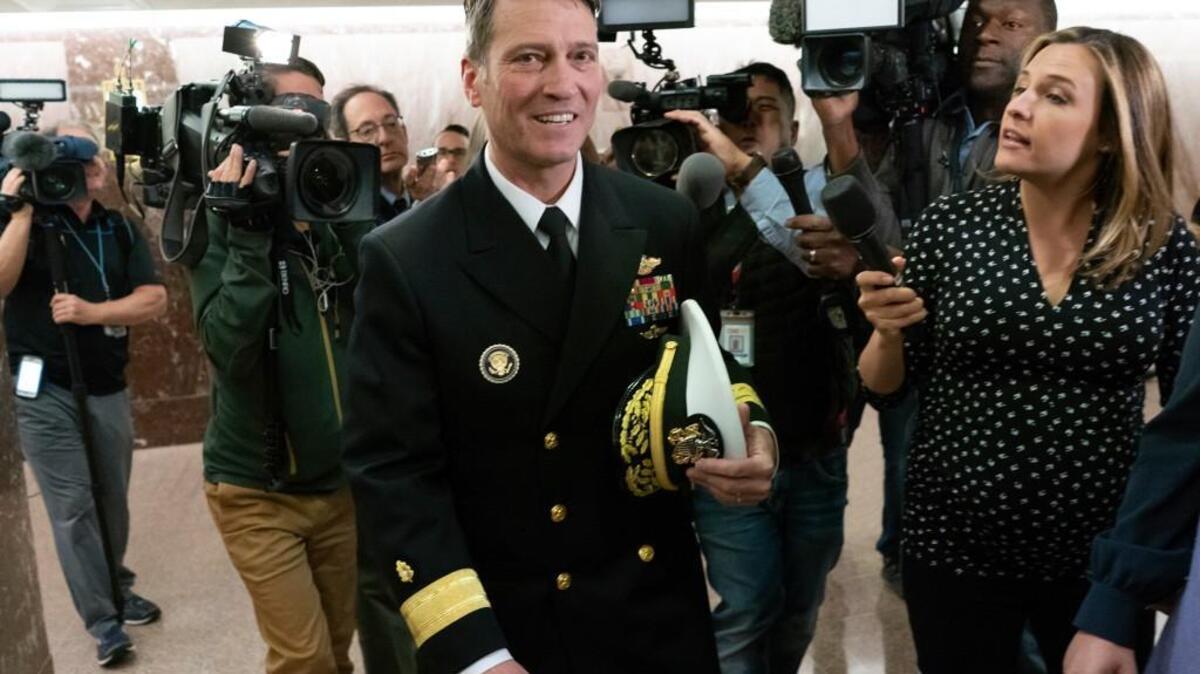 Rear Adm. Ronny Jackson, President Donald Trump's choice to be secretary of the Department of Veterans Affairs, leaves a Senate office building after meeting individually with some members of the committee that would vet him for the post on Capitol Hill in Washington, D.C., on Tuesday.