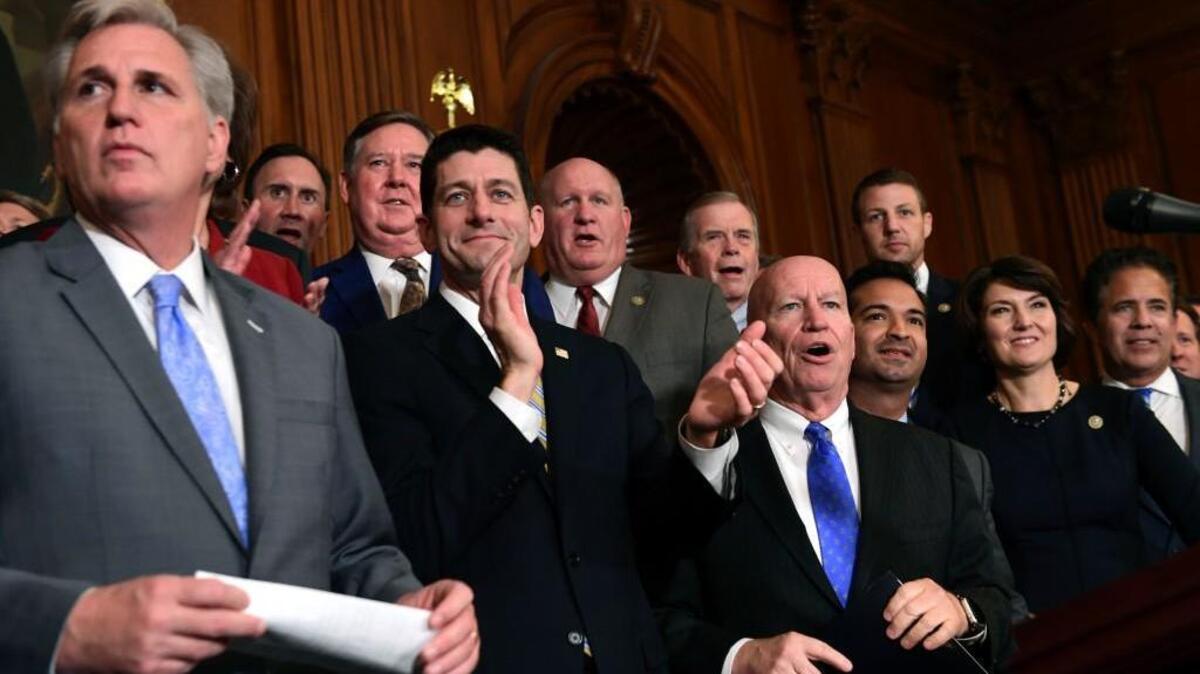 House Republicans, including House Majority Leader Kevin McCarthy of Calif., left, House Speaker Paul Ryan of Wis., fourth from right, and House Ways and Means Committee Chairman Rep. Kevin Brady, R-Texas, fifth from right, wait to start a news conference following a vote on tax reform on Capitol Hill in Washington, Thursday, Nov. 16, 2017. Republicans passed a near $1.5 trillion package overhauling corporate and personal taxes through the House.