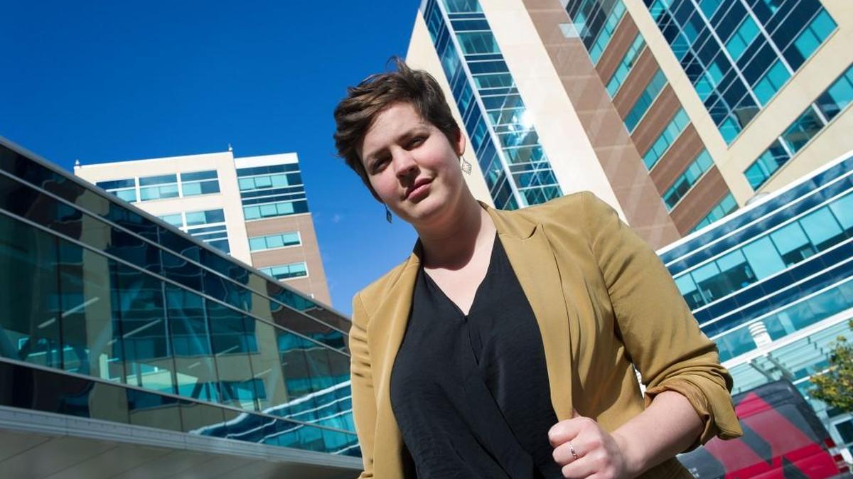 Elizabeth Stone, 29, outside of INOVA Fairfax Hospital Center where she underwent an autologous stem-cell transplant in 2013, in Fairfax, VA, Tuesday, Oct. 24, 2017. Stone was diagnosed with lymphoma in her mid-20s, and with treatment has kept the cancer in check for five years. She doesn't qualify for subsidized premiums, but without the ACA she questions if any insurer would have covered her.