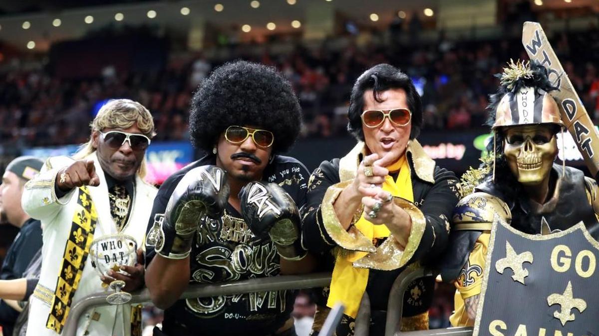 New Orleans Saints fans cheer from the stands during an NFL football game against the Denver Broncos in New Orleans, Sunday, Nov. 13, 2016.