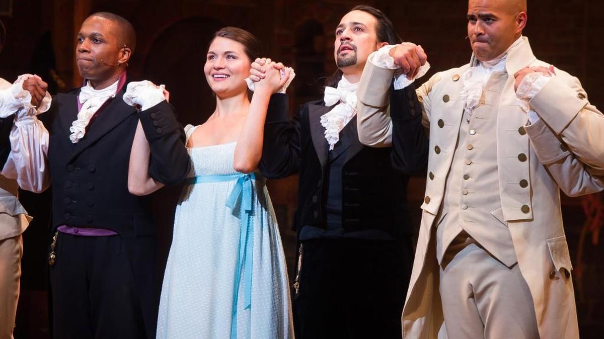 Leslie Odom Jr., from left, Phillipa Soo, Lin-Manuel Miranda and Christopher Jackson appear at the curtain call following the opening night performance of "Hamilton" at the Richard Rodgers Theatre on Thursday, Aug. 6, 2015, in New York.
