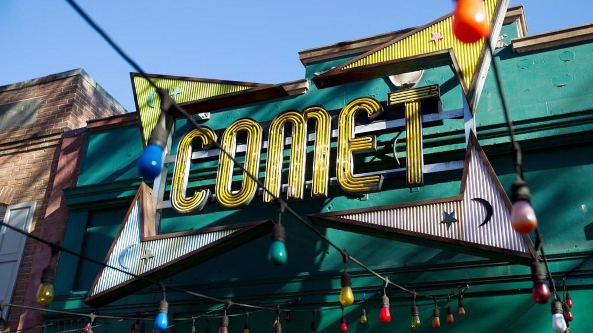 The front door of Comet Ping Pong pizza shop, in Washington, Monday, Dec. 5, 2016. A fake news story prompted a man to fire a rifle inside a popular Washington, D.C., pizza place as he attempted to “self-investigate” a conspiracy theory that Hillary Clinton was running a child sex ring from there, police said.