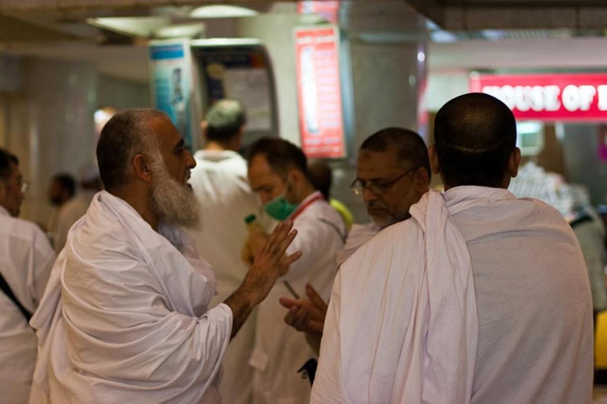 Pilgrims dressed in white garments.