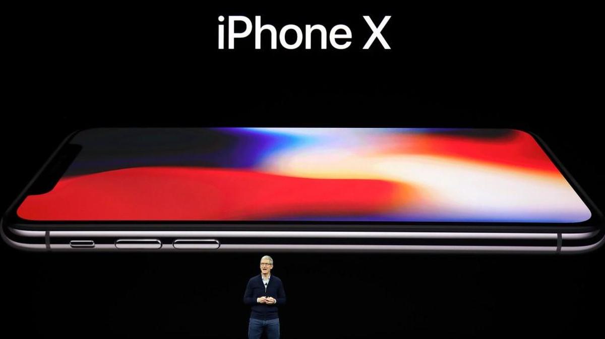 Apple CEO Tim Cook announces the new iPhone X at the Steve Jobs Theater on the new Apple campus, Tuesday, Sept. 12, 2017, in Cupertino, Calif.