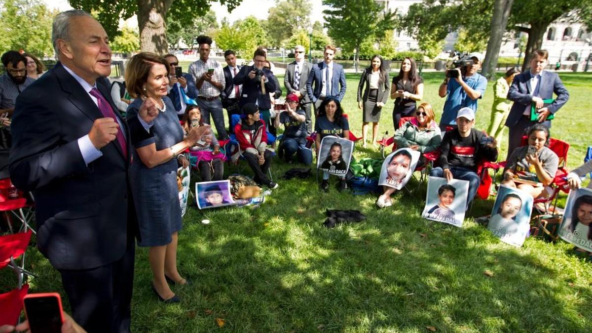Senate Minority Leader Chuck Schumer of N.Y., accompanied by House Minority Leader Nancy Pelosi of Calif. speaks with DREAMERS who were holding a 4-day fast on Capitol Hill in Washington, Thursday, Sept. 7, 2017. House and Senate Democrats gather to call for Congressional Republicans to stand up to President Trump's decision to terminate the Deferred Action for Childhood Arrivals (DACA) initiative by bringing the DREAM Act for a vote on the House and Senate Floor.