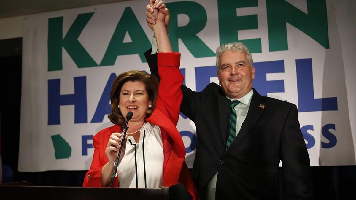 Republican candidate for Georgia’s 6th District Congressional seat Karen Handel declares victory with her husband Steve.