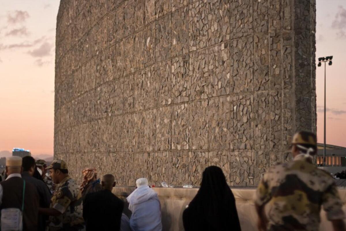Pilgrims stoning the devil in Mina