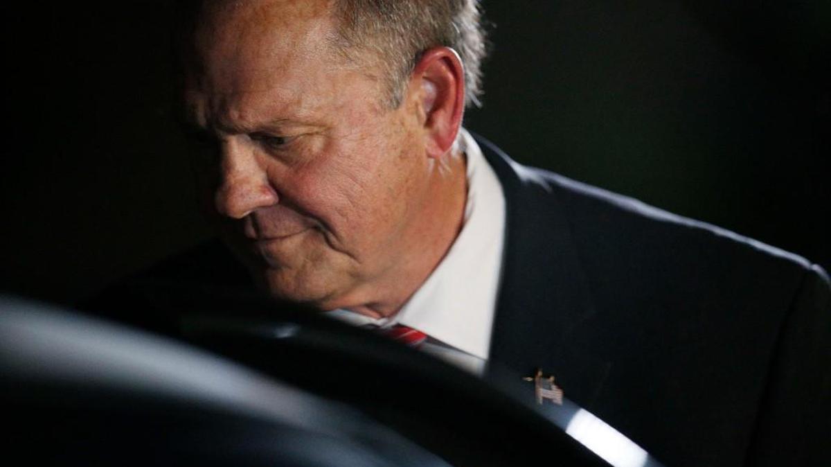 Former Alabama Chief Justice and U.S. Senate candidate Roy Moore leaves after he speaks at a church revival, Tuesday, Nov. 14, 2017, in Jackson, Alabama.