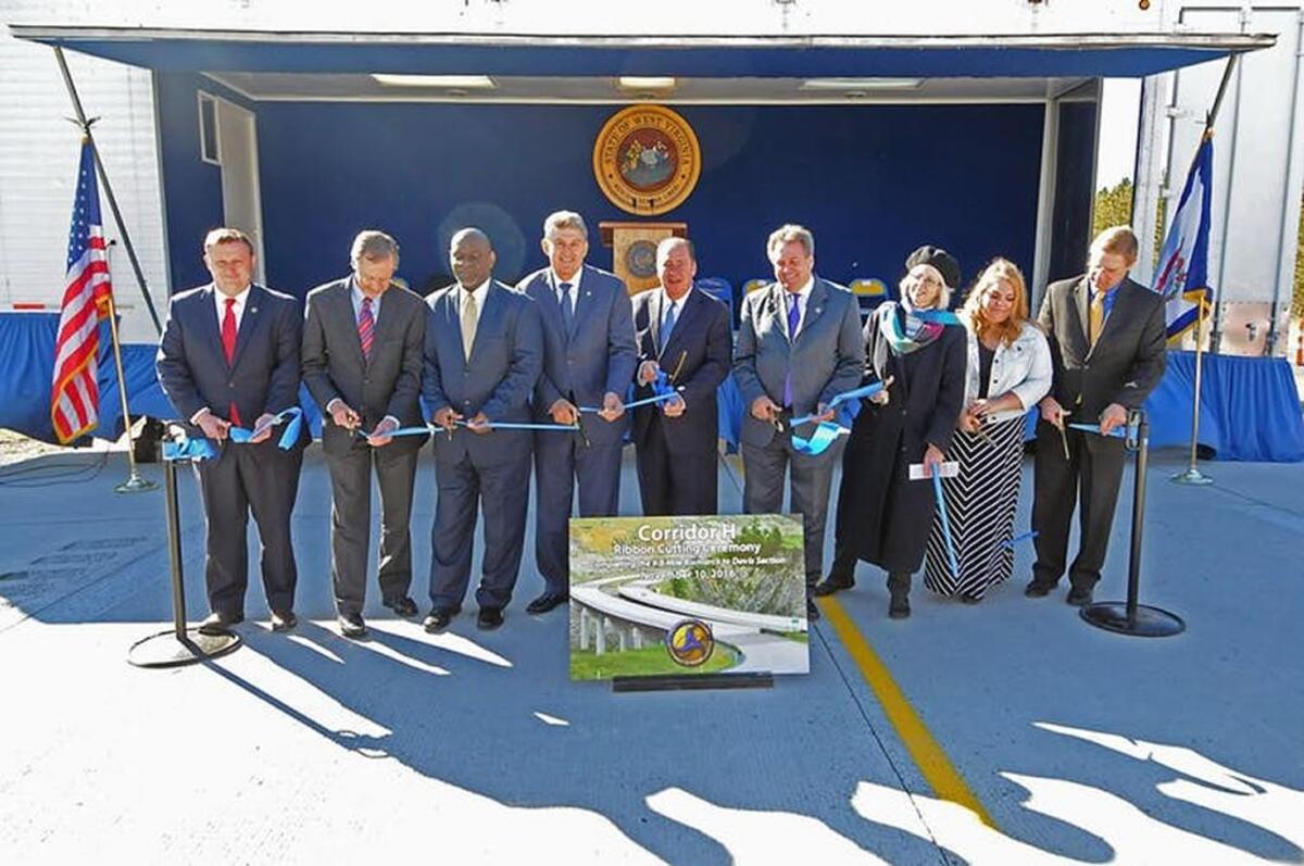 West Virginia Governor Earl Ray Tomblin and Secretary of Transportation Paul Mattox, U.S. Senator Joe Manchin, and representatives from the Appalachian Regional Commission and other federal, state and local agencies break ground on a 7.9-mile section of Corridor H, a new four-lane highway.