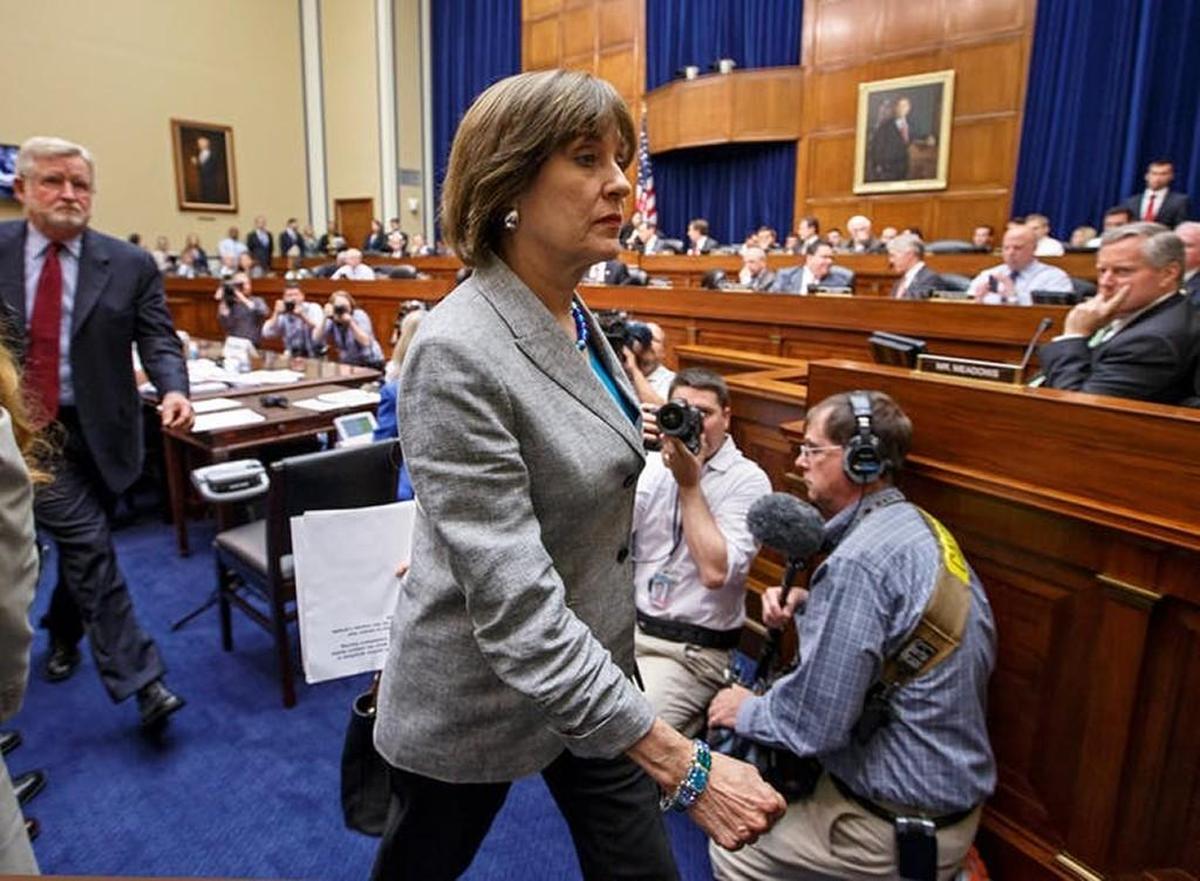 IRS official Lois Lerner refused to answer questions from lawmakers about whether her team scrutinized the applications of conservative groups seeking tax-exempt status more closely than the paperwork filed by other organizations.