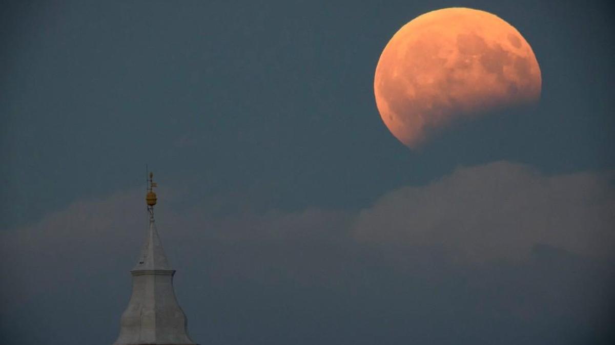 This Aug. 7, 2017 photo shows the partial lunar eclipse photographed from Tiszafoldvar, 144 kms southeast of Budapest, Hungary.