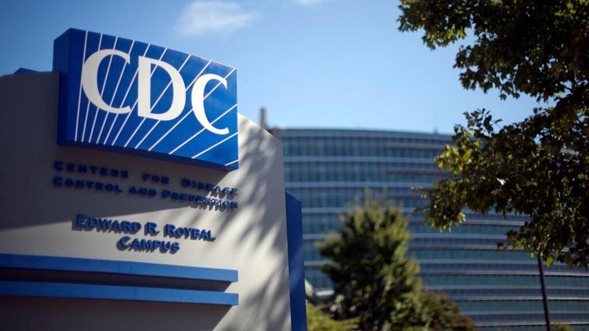 A sign marks the entrance to the federal Centers for Disease Control and Prevention in Atlanta.