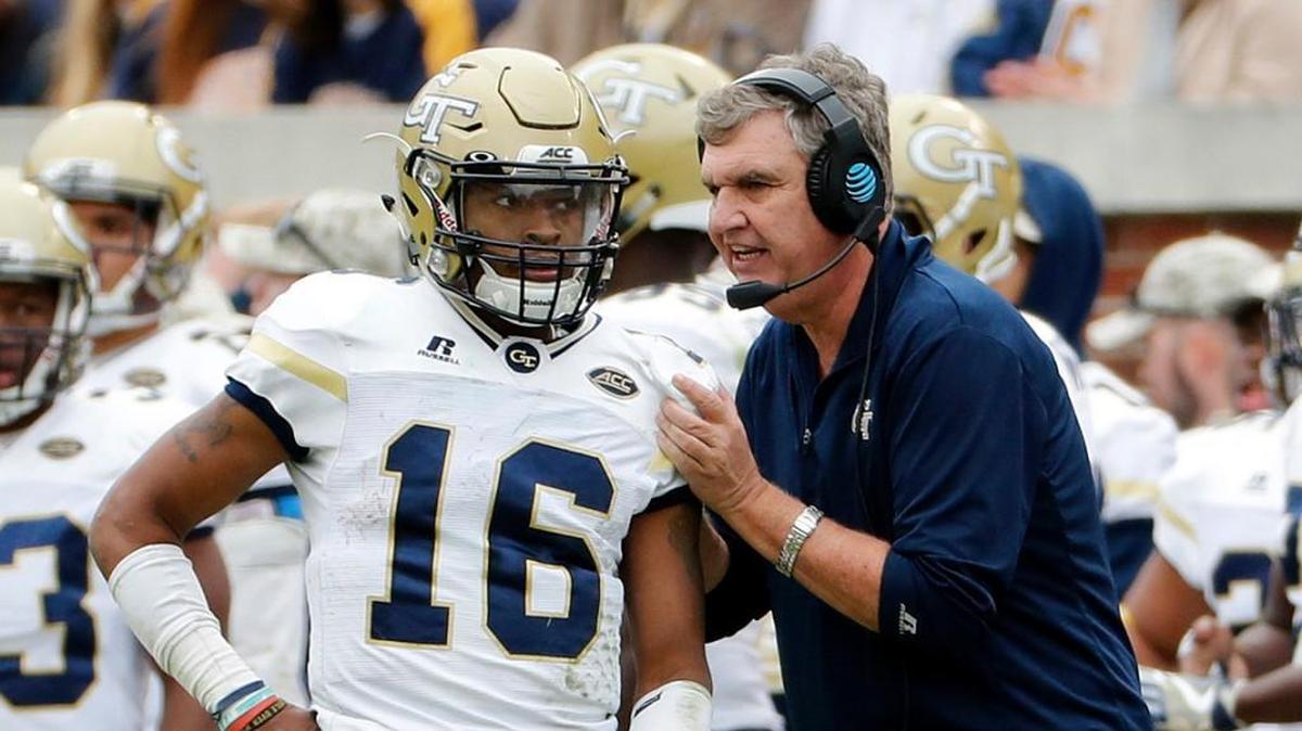 Georgia Tech head coach Paul Johnson, right, talks with quarterback TaQuon Marshall during a game against Virginia Tech in Atlanta on Nov. 11. Whether Marshall can take the next step and become a better all-around player is a key question for Georgia Tech this season.