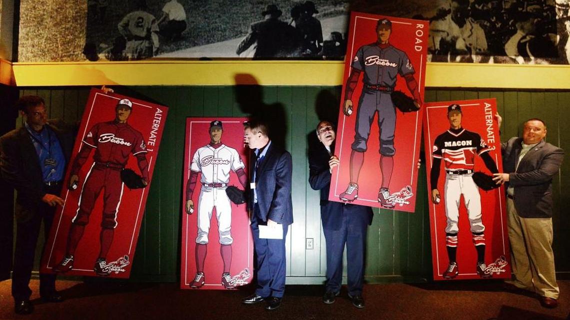 From left, team owner Steve DeLay, team president Todd Pund, Macon-Bibb County Mayor Robert Reichert and league Commissioner Justin Sellers unveil the uniform combinations for the Macon Bacon on Wednesday evening at the Georgia Sports Hall of Fame. The Coastal Plain League baseball team’s opening day will be June 1, 2018.