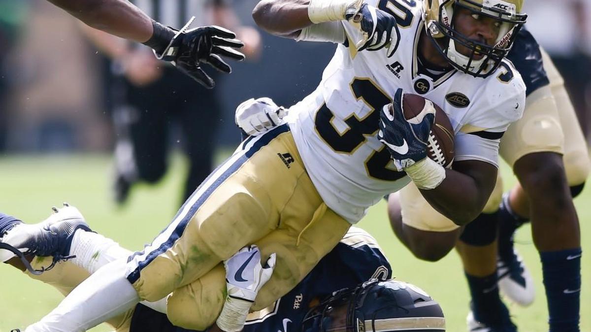 Georgia Tech running back KirVonte Benson (30) works against Pittsburgh during the first half of Saturday’s ACC game.