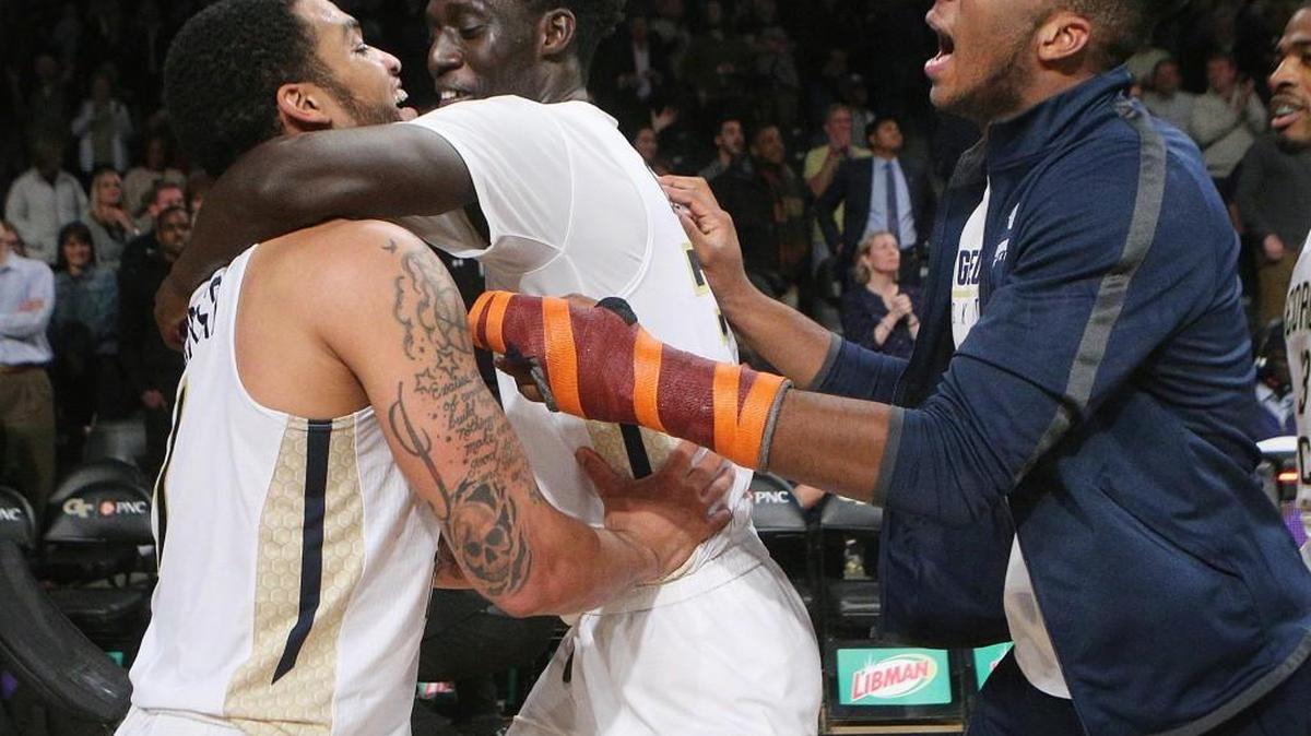 Georgia Tech guard Tadric Jackson, from left, celebrates his game winning shot with Abdoulaye Gueye and injured guard Josh Okogie Tuesday in Atlanta.