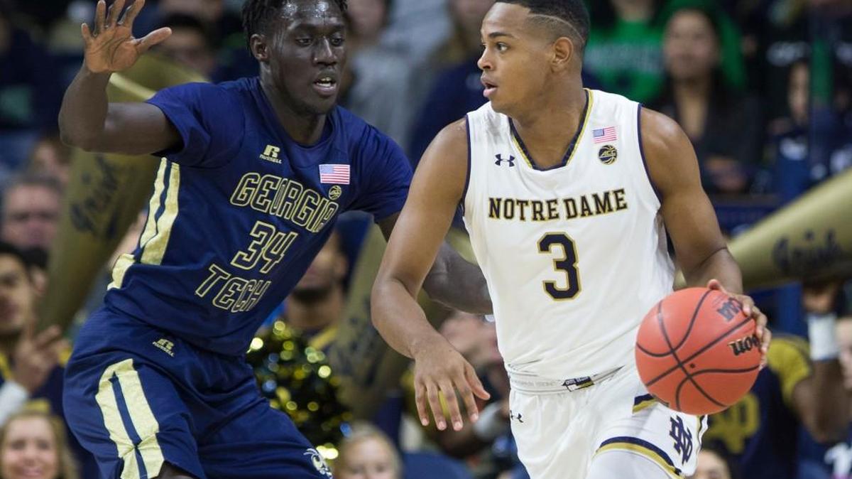 Notre Dame’s D.J. Harvey (3) moves by Georgia Tech’s Abdoulaye Gueye (34) during their game Dec. 30 in South Bend, Indiana.