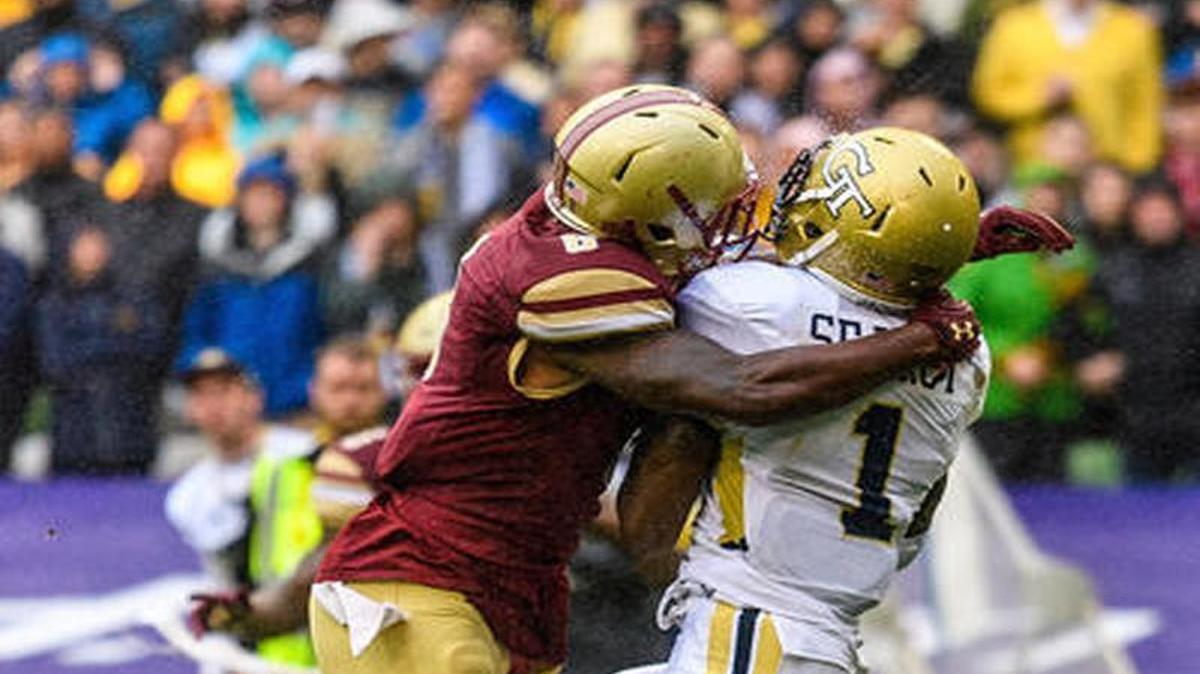 Georgia Tech’s Qua Searcy (1) catches a pass against Boston College defensive back William Harris during the first half Saturday.