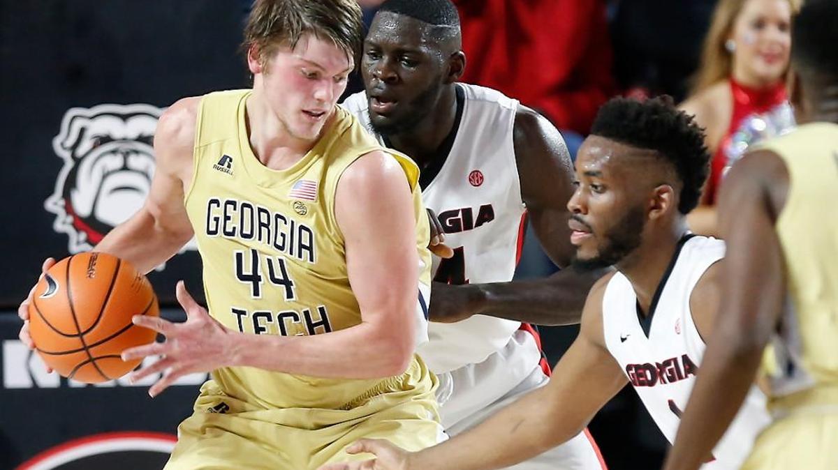 Georgia Tech center Ben Lammers (44) tries to get by Georgia forward Yante Maten (1) and Georgia forward Derek Ogbeide during a game in Athens in this month.