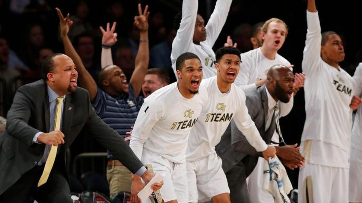The Georgia Tech bench celebrates during the second half of the Yellow Jackets’ 76-61 win Tuesday over Cal State Bakersfield in an NIT semifinal. Georgia Tech faces TCU on Thursday for the NIT championship.