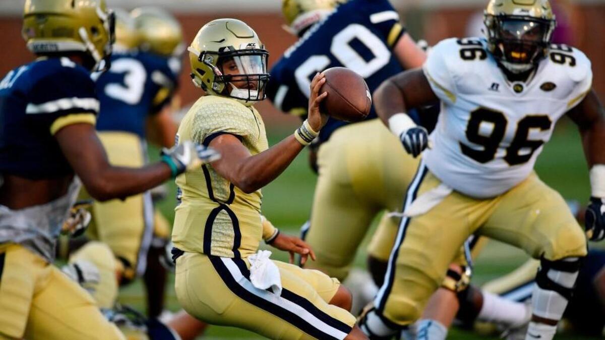 Georgia Tech quarterback Lucas Johnson pitches the ball during the team’s spring game Friday in Atlanta.
