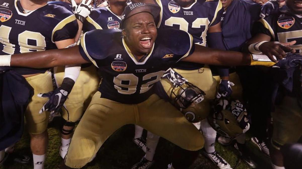 Georgia Tech defensive lineman Francis Kallon (92) celebrates with his teammates after the Orange Bowl NCAA college football game against Mississippi State, Wednesday, Dec. 31, 2014, in Miami Gardens, Fla. Georgia Tech defeated Mississippi State 49-34.