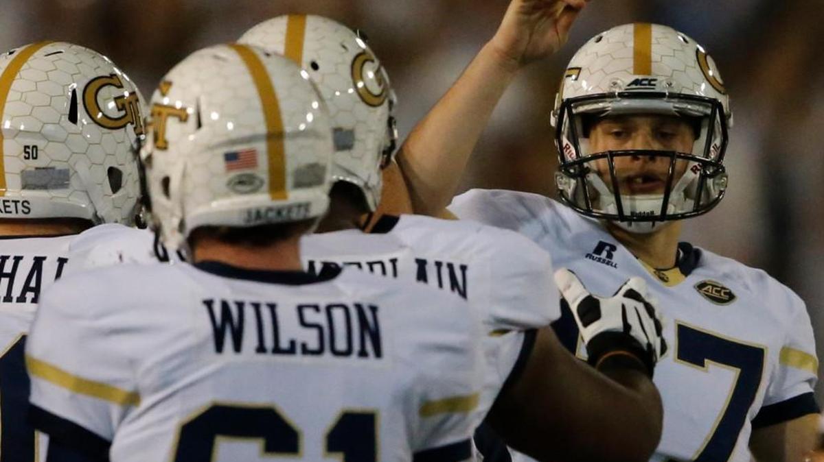 Georgia Tech place-kicker Harrison Butker, right, is tied for the program’s all-time scoring lead
