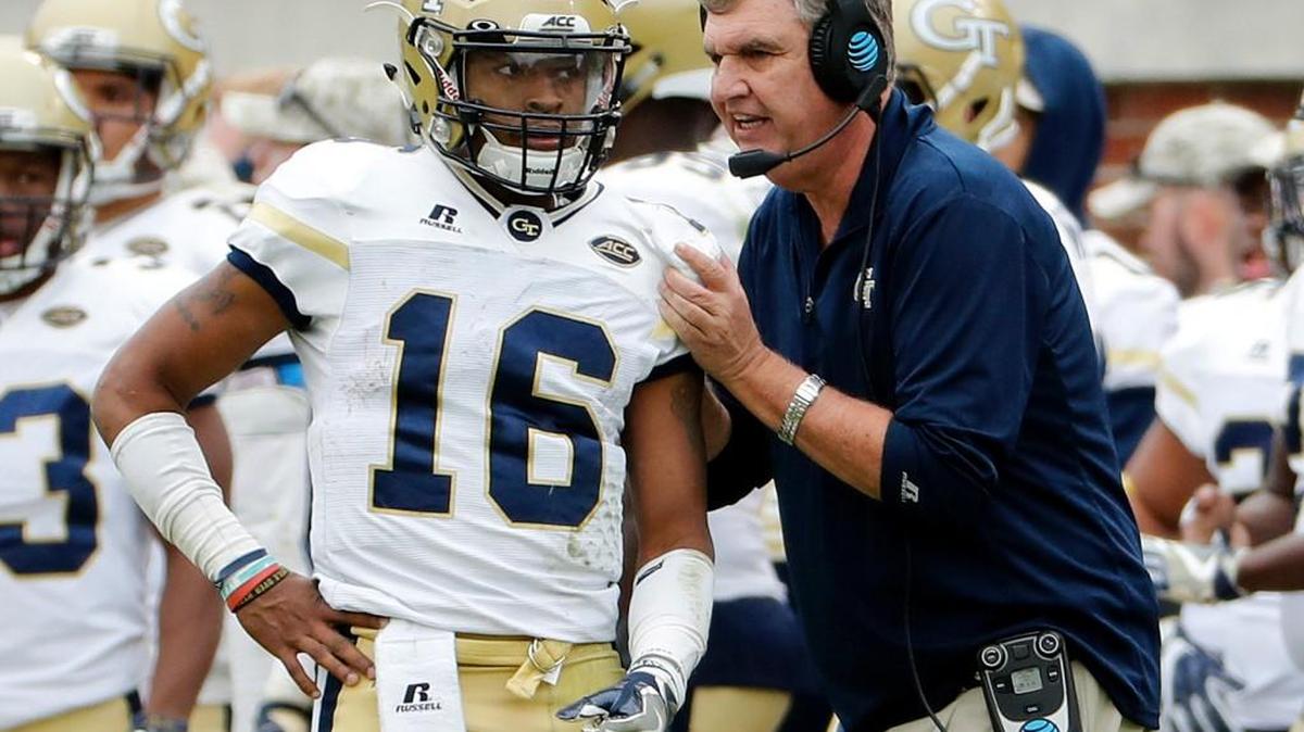 Georgia Tech head coach Paul Johnson, right, talks with quarterback TaQuon Marshall during the third quarter of an their game against Virginia Tech in Atlanta on Nov. 11.