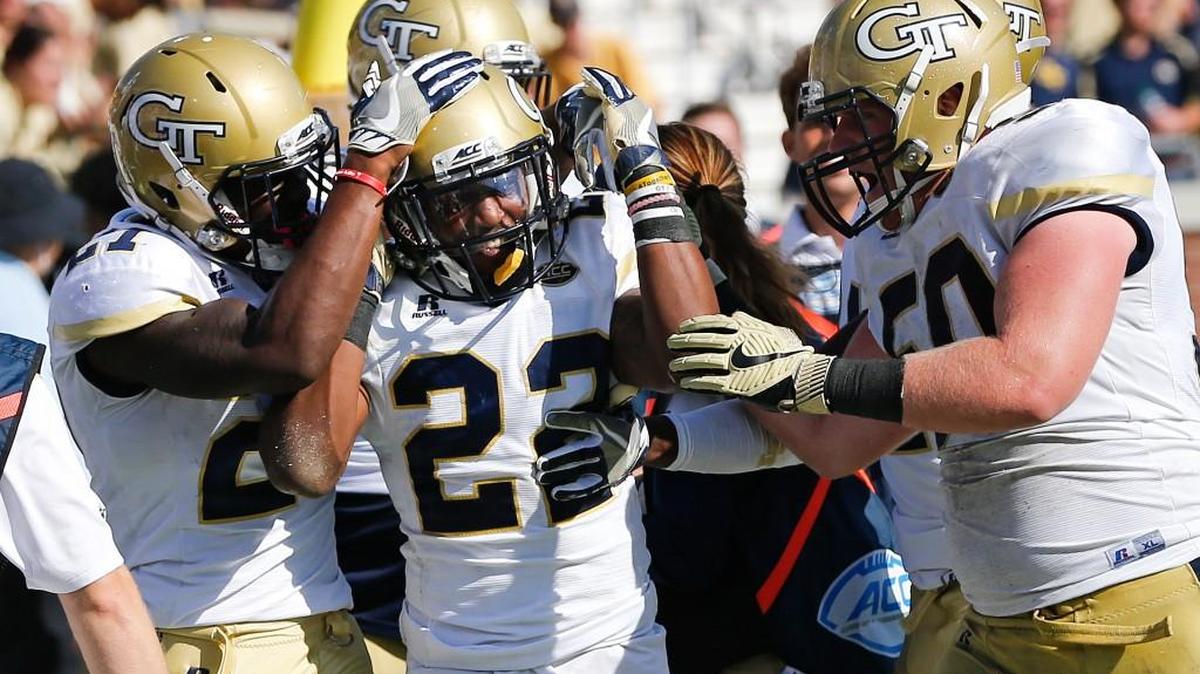 Georgia Tech's Clinton Lynch (22) celebrates with Lyn Griffin (27) and Andrew Marshall (50) after a touchdown catch against Duke in the second half Saturday, Oct. 29, 2016 against Duke.
