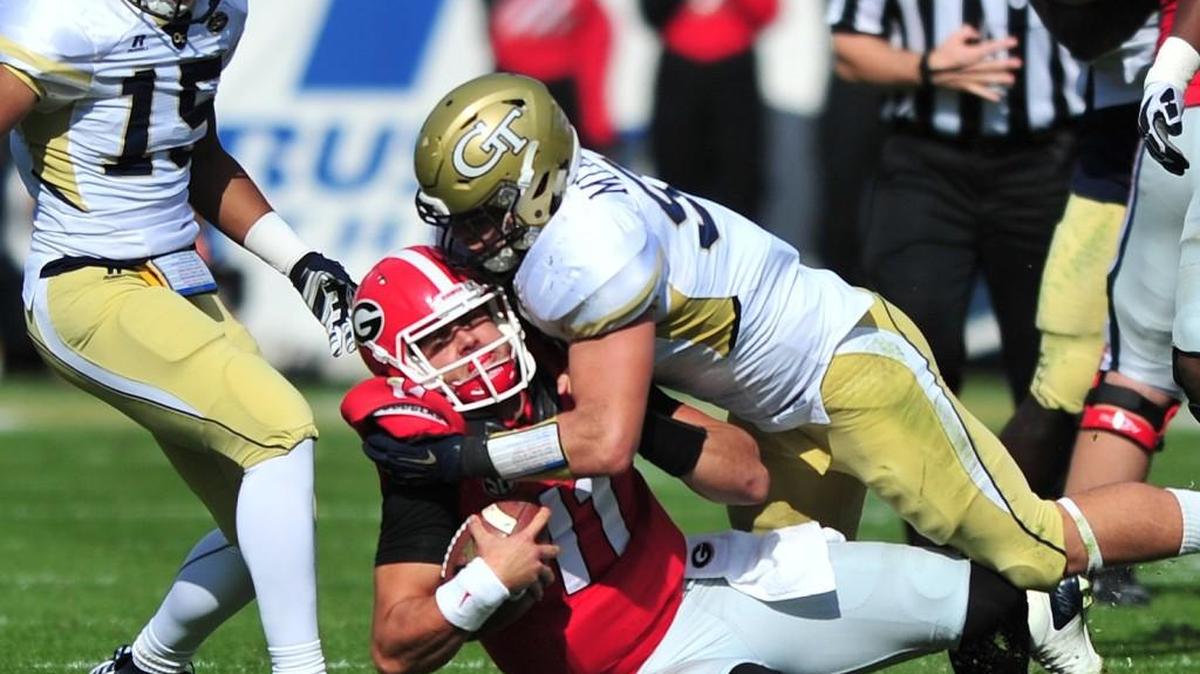 Georgia Tech defender Brant Mitchell sacks UGA quarterback Greyson Lambert during the 2015 clash at Bobby Dodd Stadium in Atlanta.