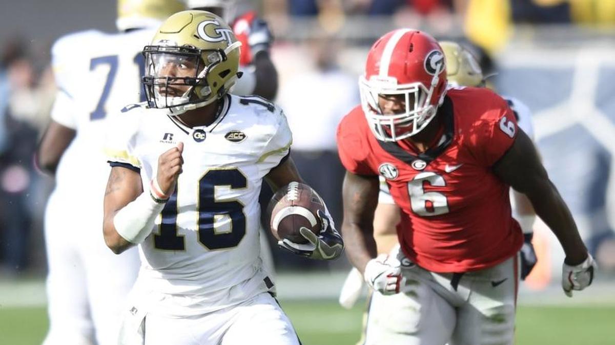 Georgia Tech's quarterback TaQuon Marshall (16) runs upfield against Georgia Saturday, Nov. 25, 2017.