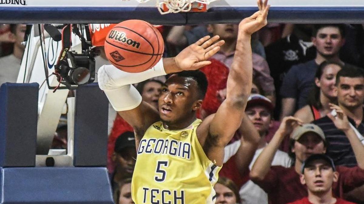 Georgia Tech guard Josh Okogie (5) dunks against Mississippi forward Sebastian Saiz (11) during an NCAA college basketball game in the quarterfinals of the NIT on Tuesday.