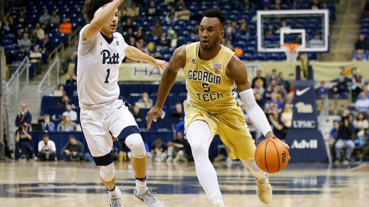 Georgia Tech guard Josh Okogie (5) drives to the basket past Pittsburgh guard Parker Stewart (1) during the first half of their game Jan. 13 in Pittsburgh.