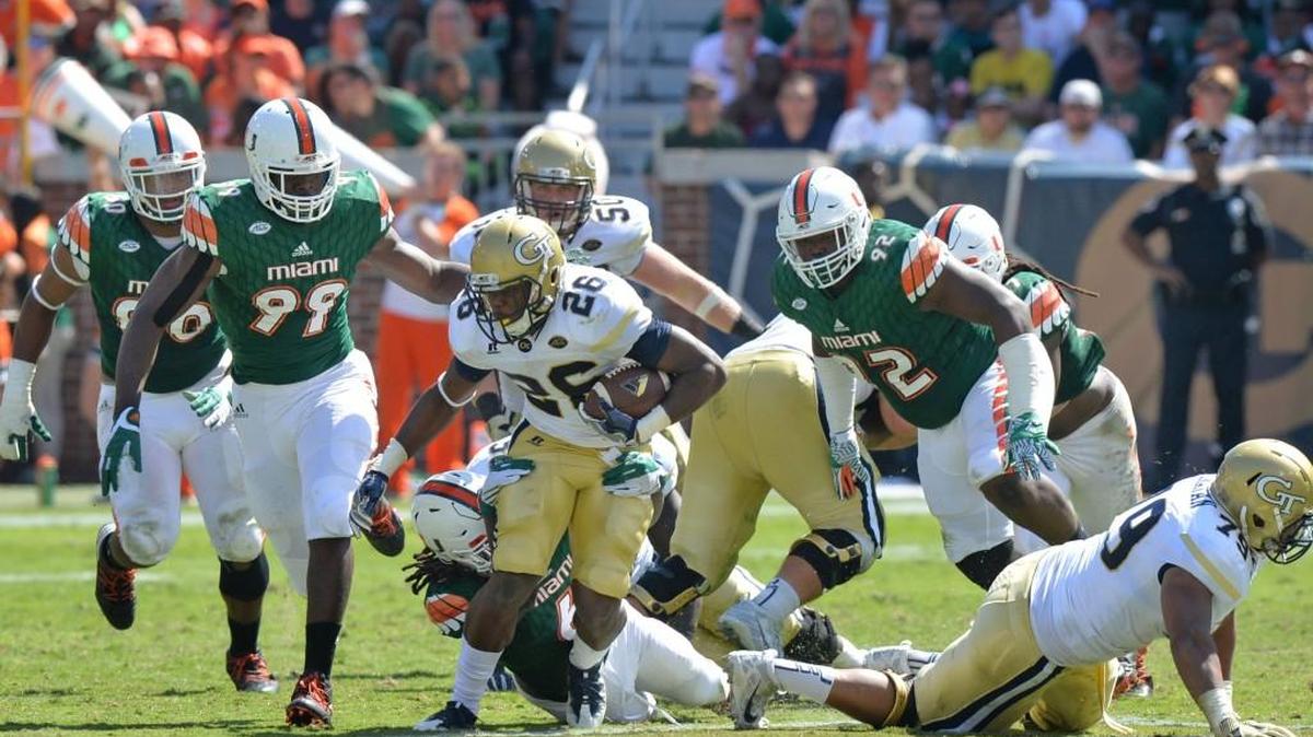 Running back Dedrick Mills (26) and the Georgia Tech Yellow Jackets travel to Pittsburgh on Saturday.
